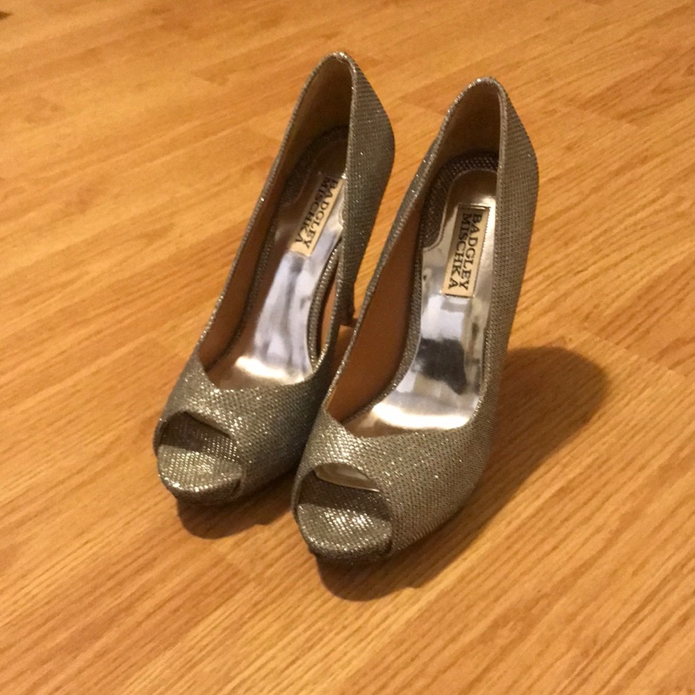 Silver Badgley Mischka peep toe pumps.